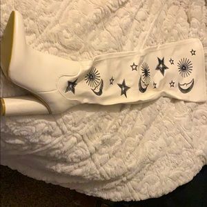 Thigh high white leather boots